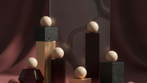 Composition abstraite de socles et de spheres, palette bordeaux et rose